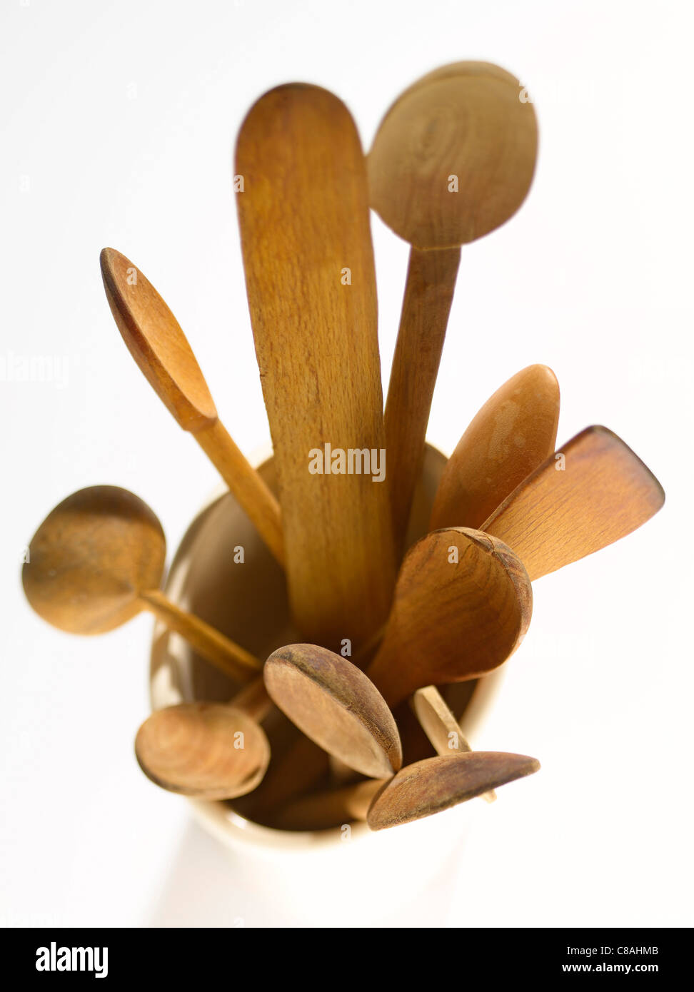 Wooden spoons in a pot Stock Photo - Alamy