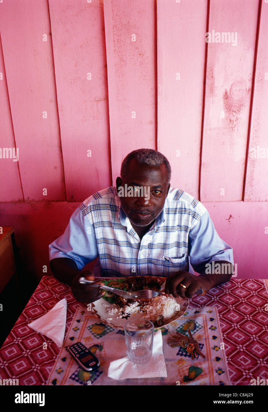 Man eating at a retaurant Stock Photo