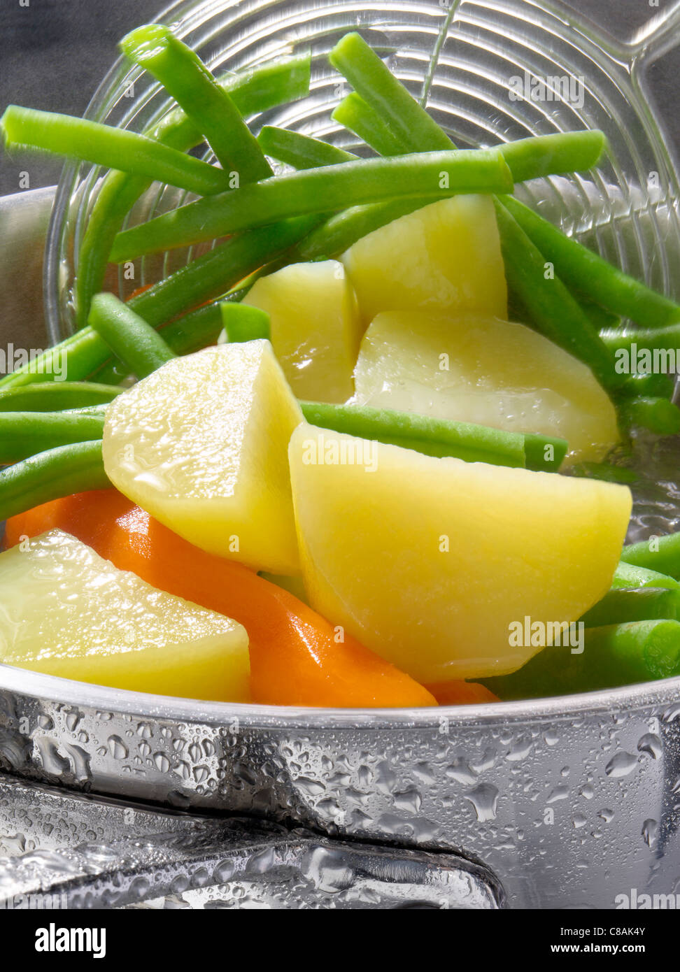 Cooking vegetables in boiling water Stock Photo Alamy