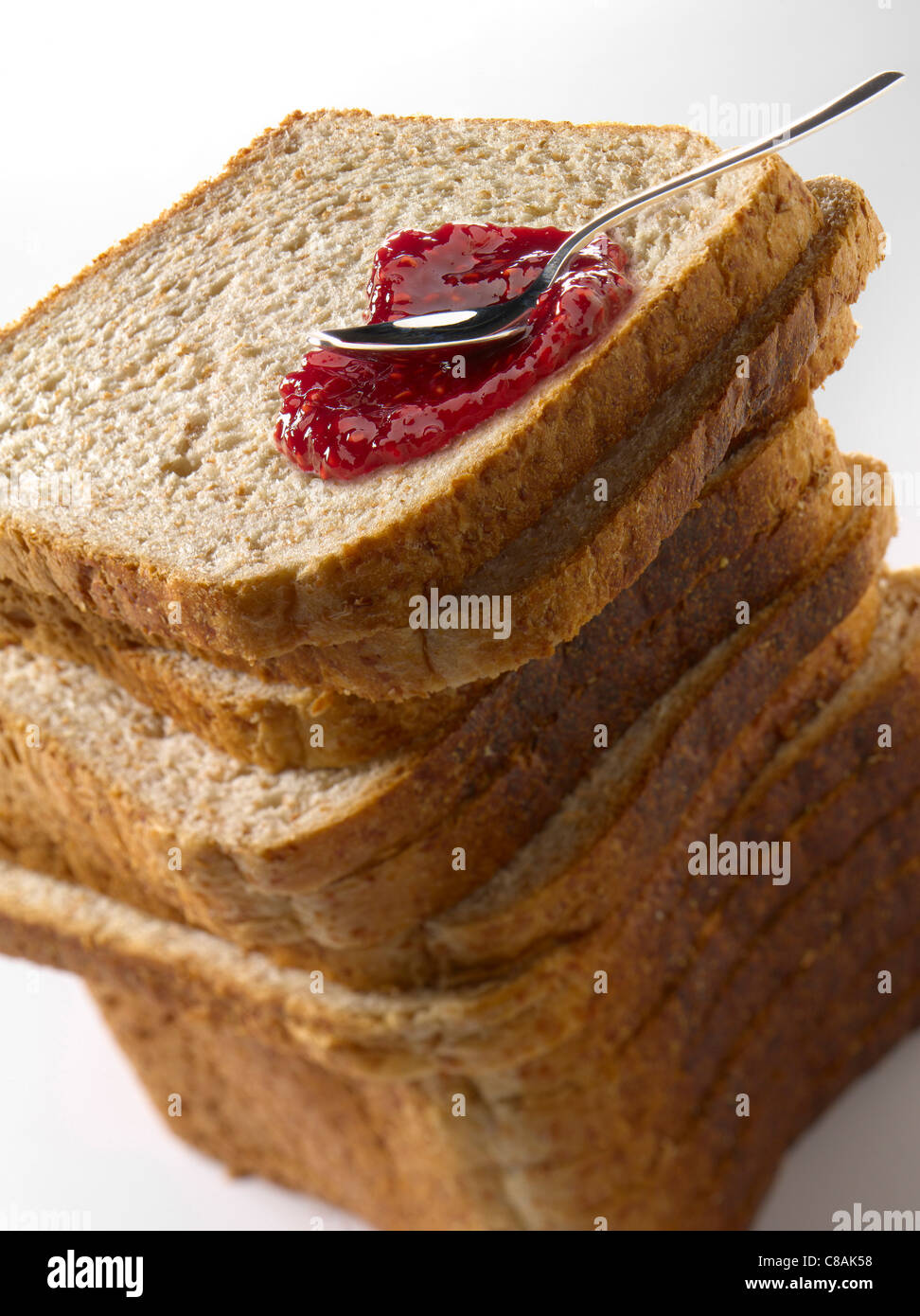Pile of sliced sandwich bread and jam Stock Photo Alamy
