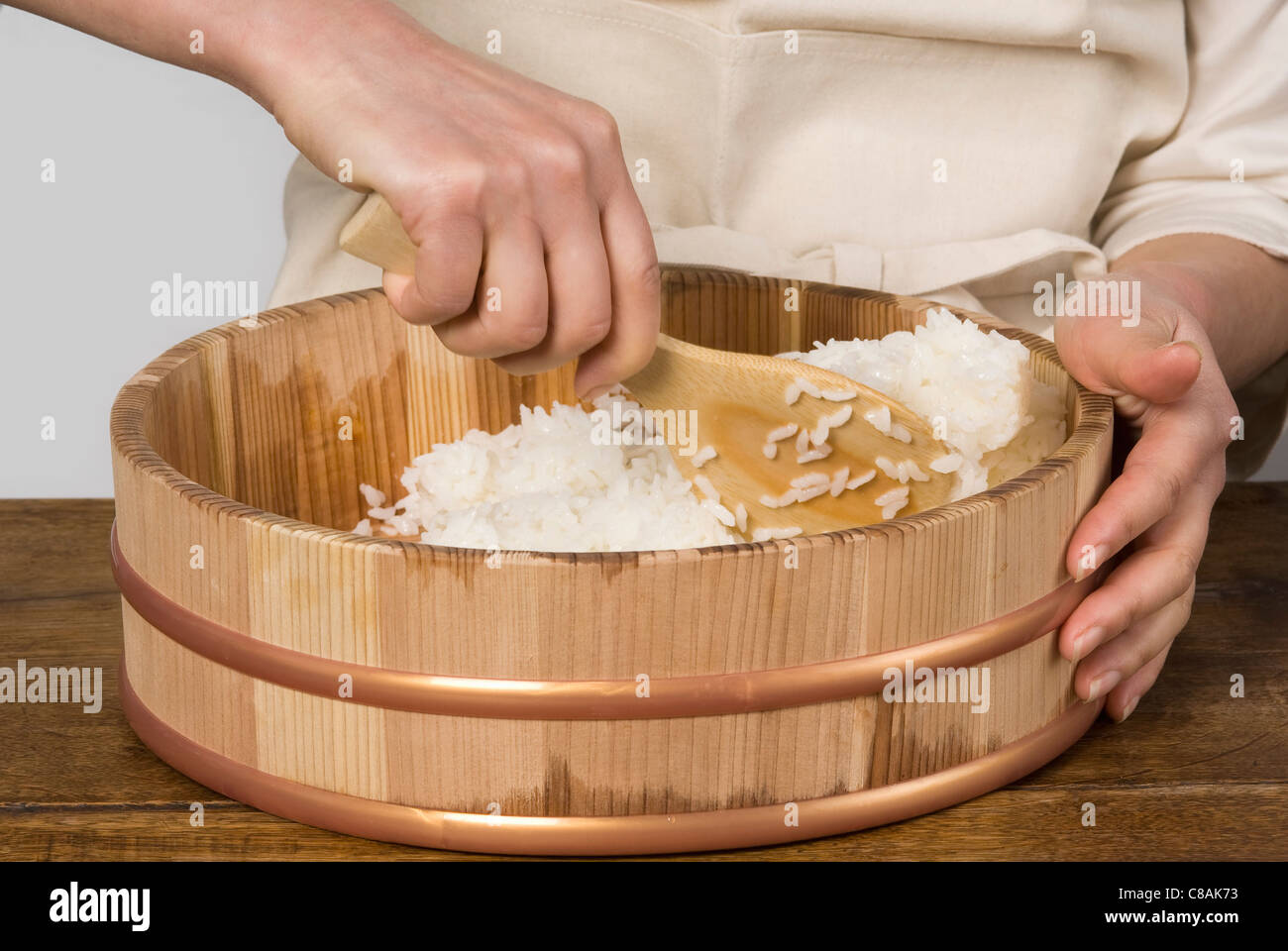 Cook preparing Japanese sticky rice Stock Photo