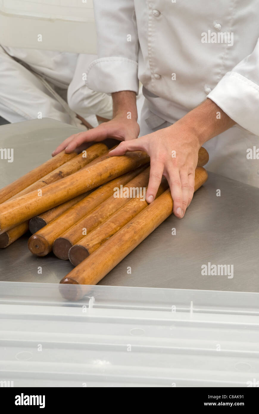 Cook and rolling pins Stock Photo