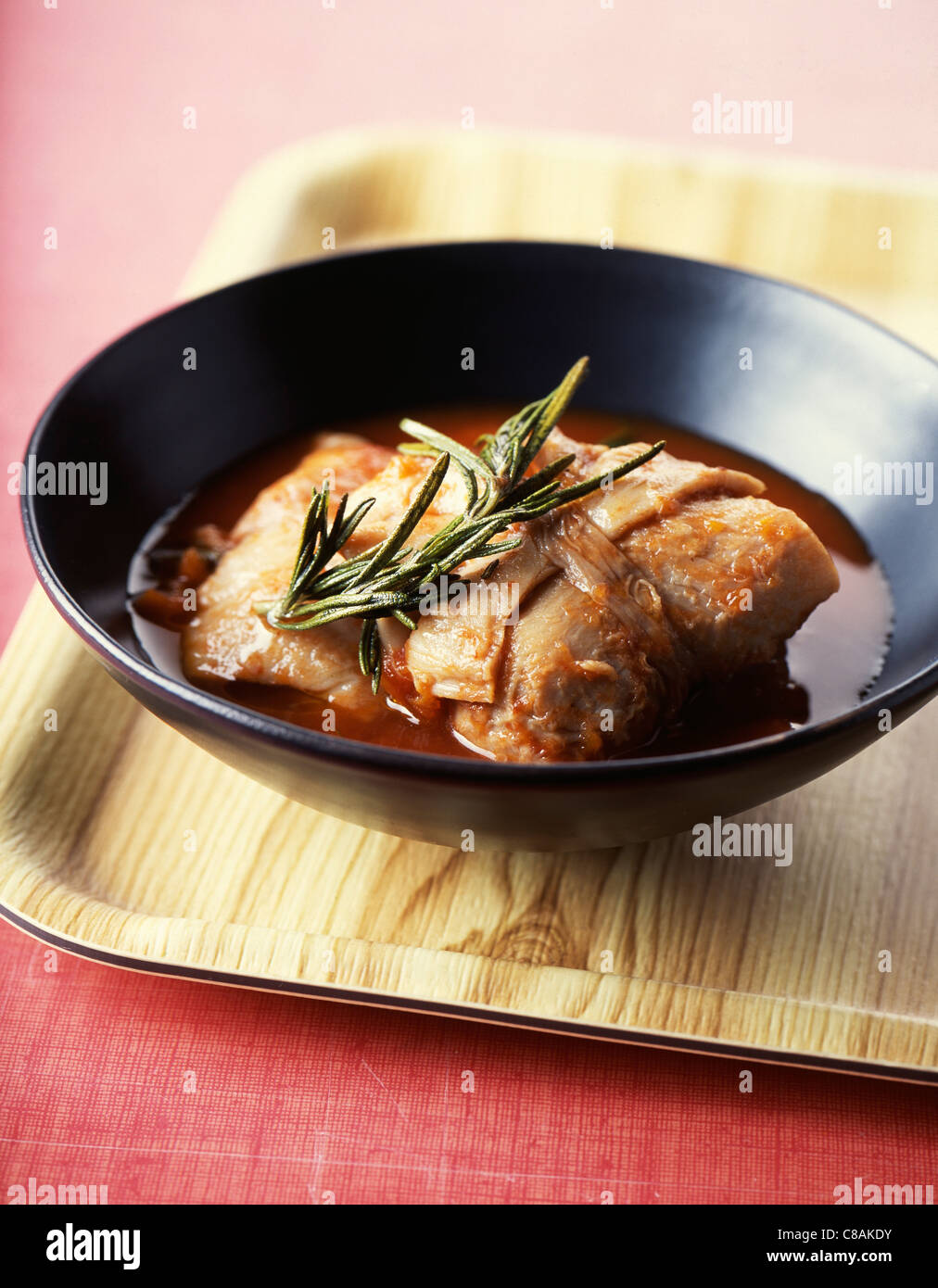 Tripoux with tomato sauce and rosemary Stock Photo