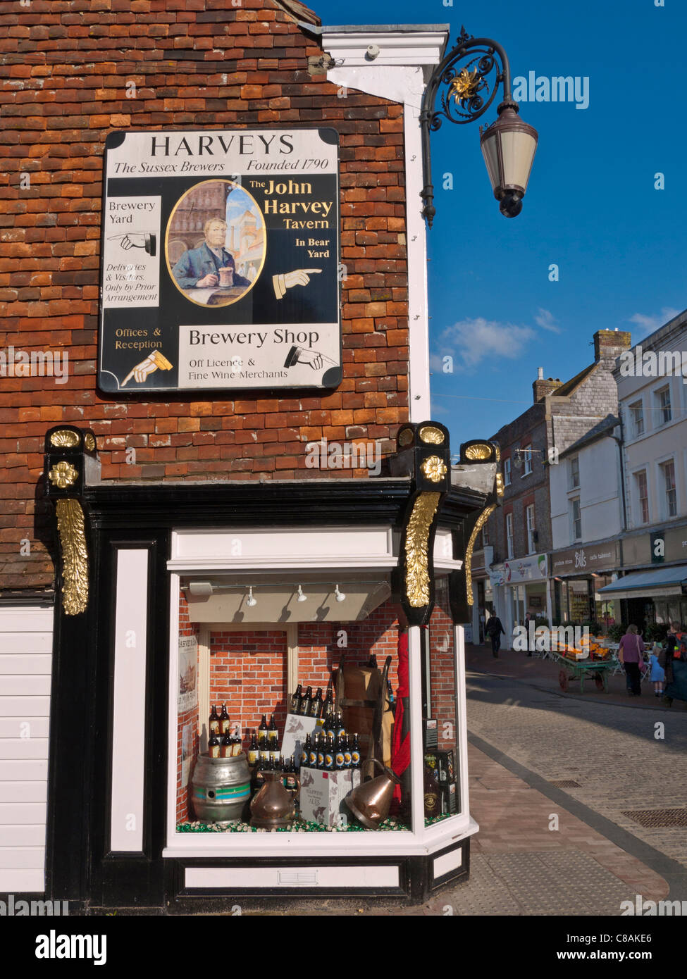 Harveys historic brewery shop and lower High Street shops Lewes East Sussex UK Stock Photo