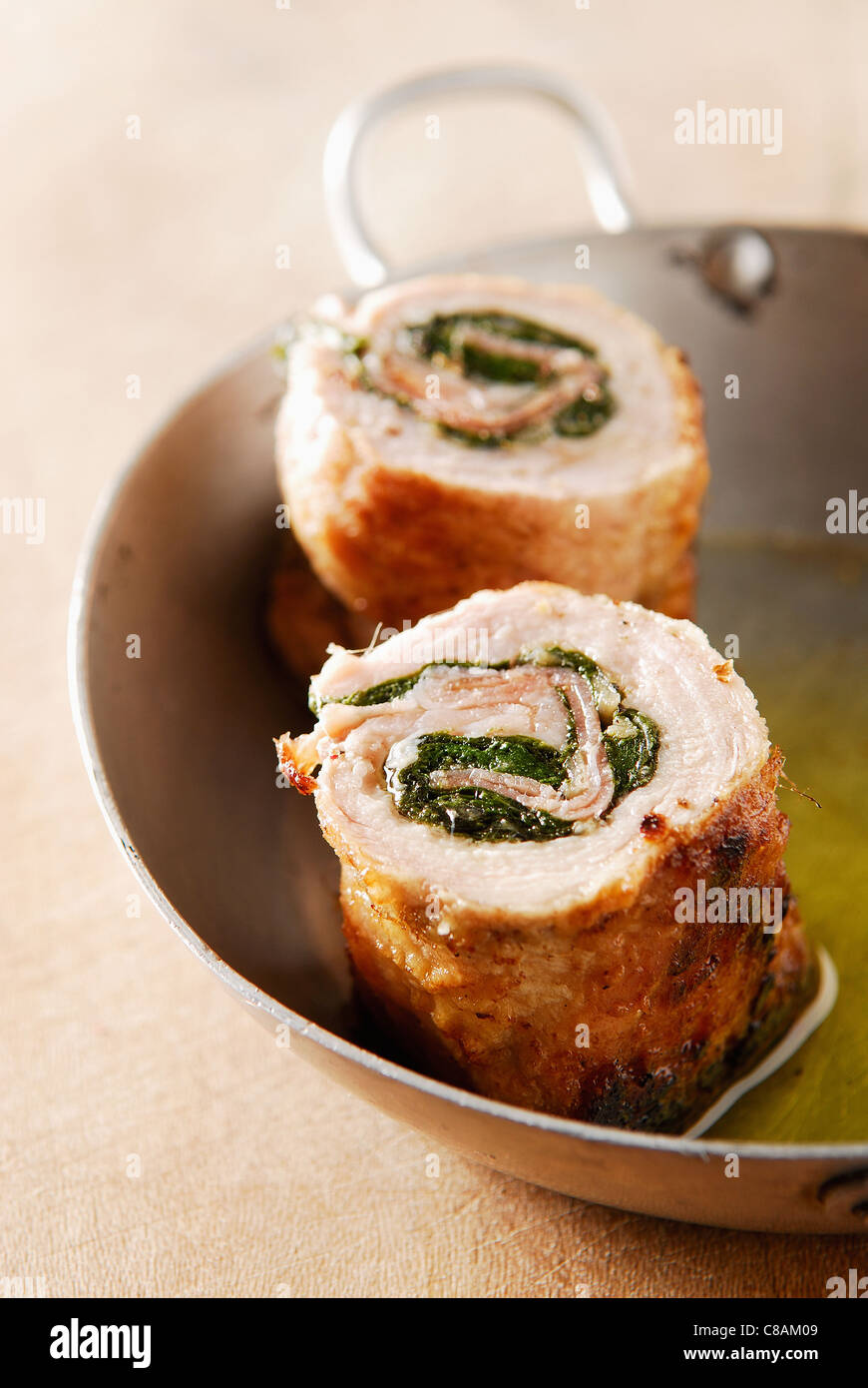Veal escalope rolls filled with spinach and raw ham Stock Photo Alamy