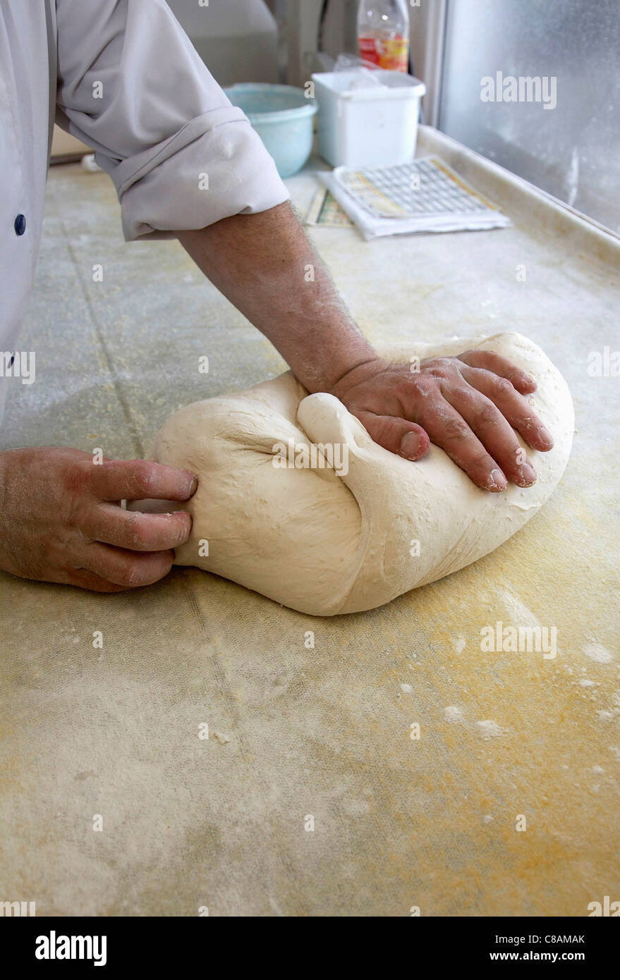 Kneading bread dough Stock Photo