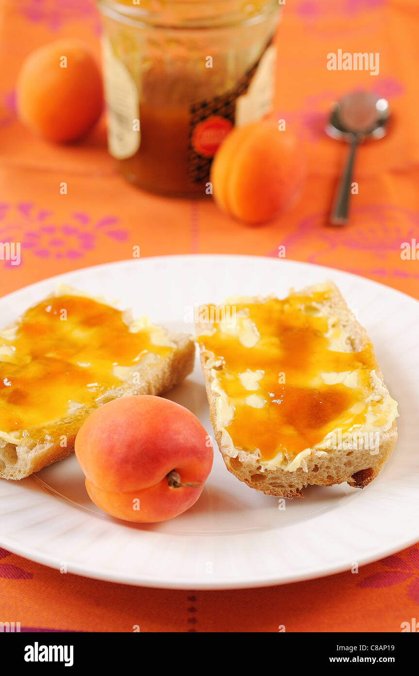 Bread,butter and apricot jam Stock Photo Alamy