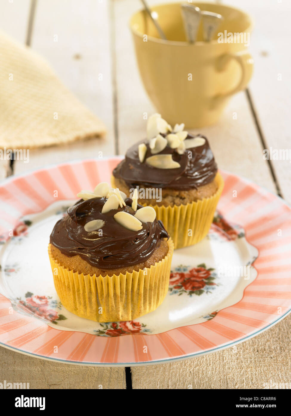 Banana cup cakes with chocolate topping Stock Photo
