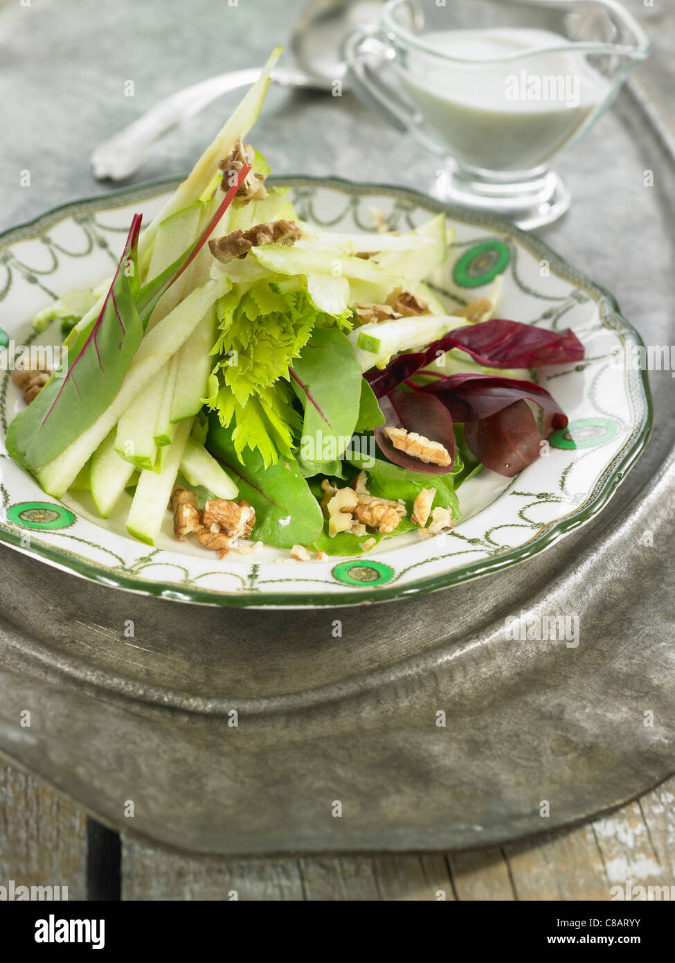 Waldorf salad with Granny Smith apple,celery stalks,walnuts and gorgonzola Stock Photo