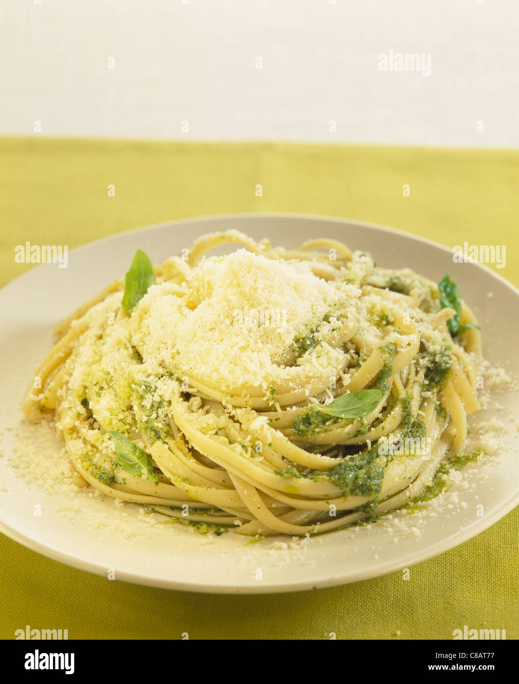Fettucine with pesto and parmesan Stock Photo