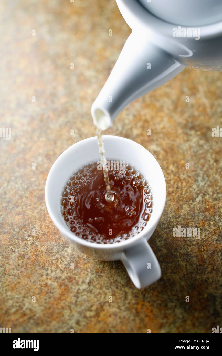 Pouring Qimen red tea Stock Photo