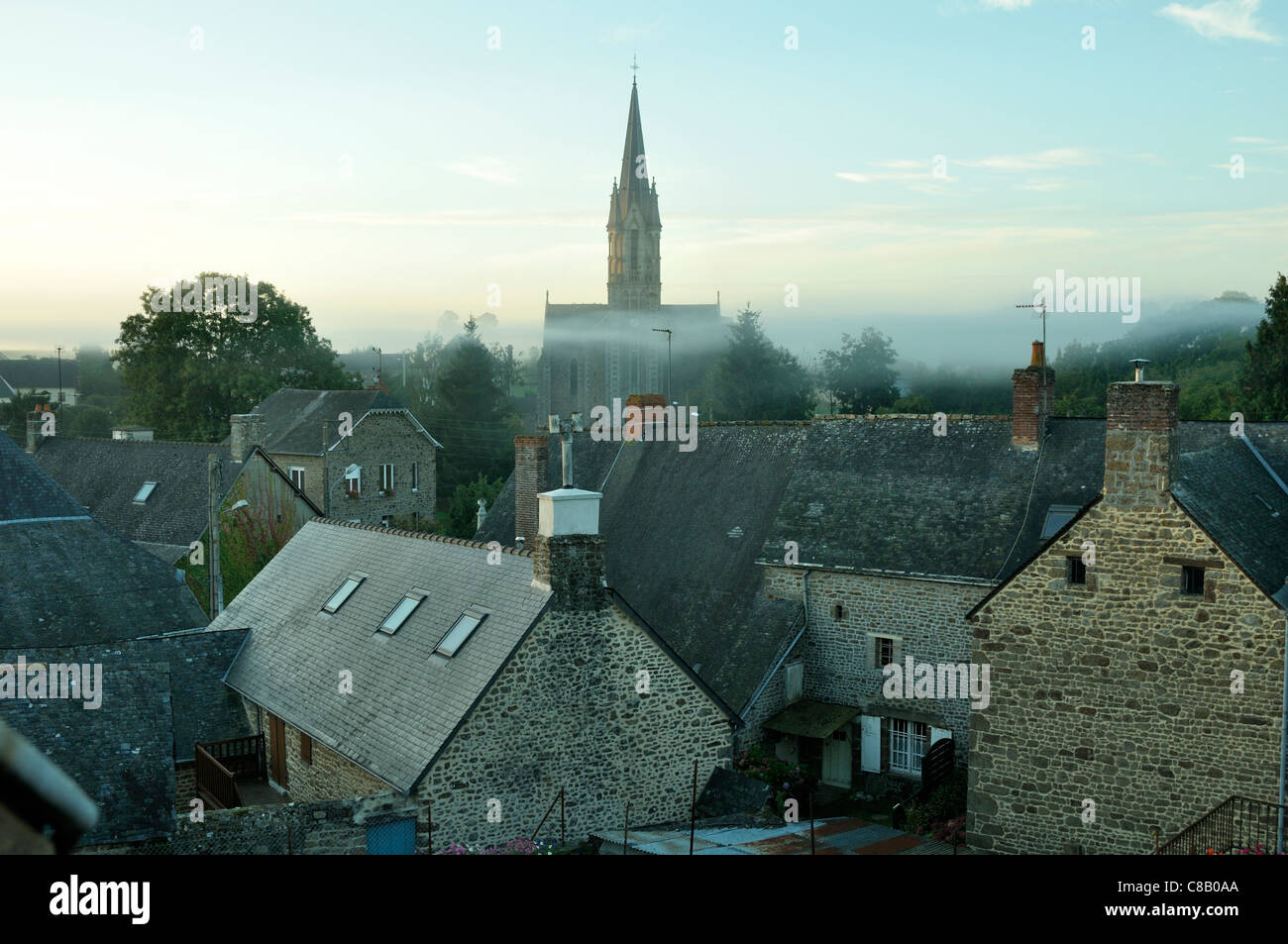 A small village in France (western France) : Le Pas, in the sunrise with fog. Stock Photo