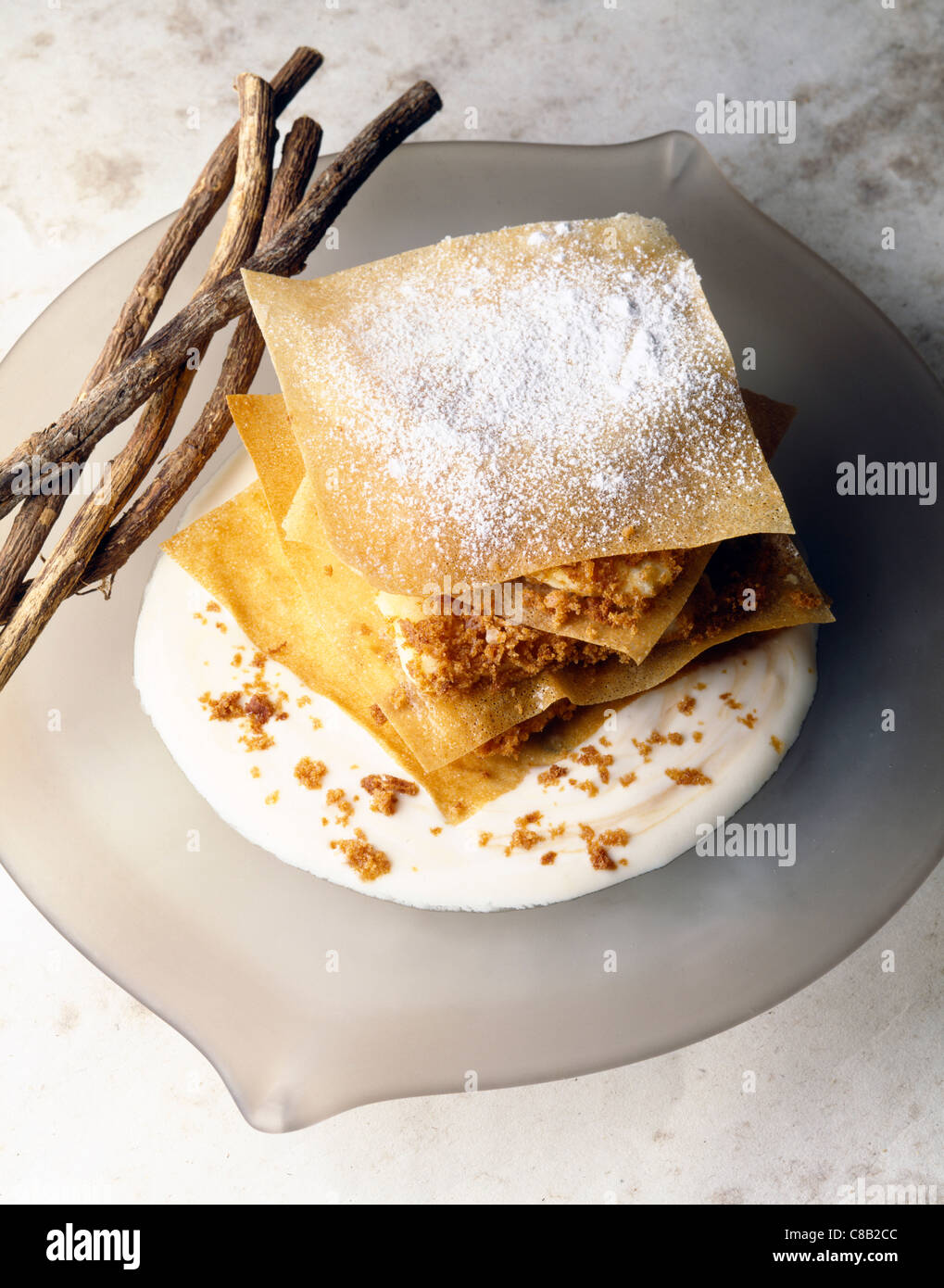 Vanilla ice cream, yoghurt and gingerbread filo pastry dessert Stock
