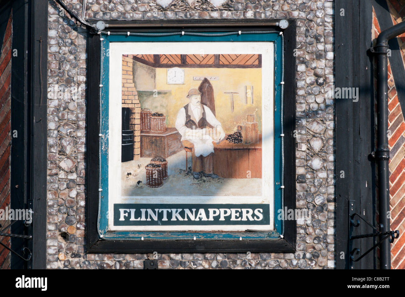 The sign of the  Flintknappers pub in the market place at Brandon, Suffolk. Stock Photo