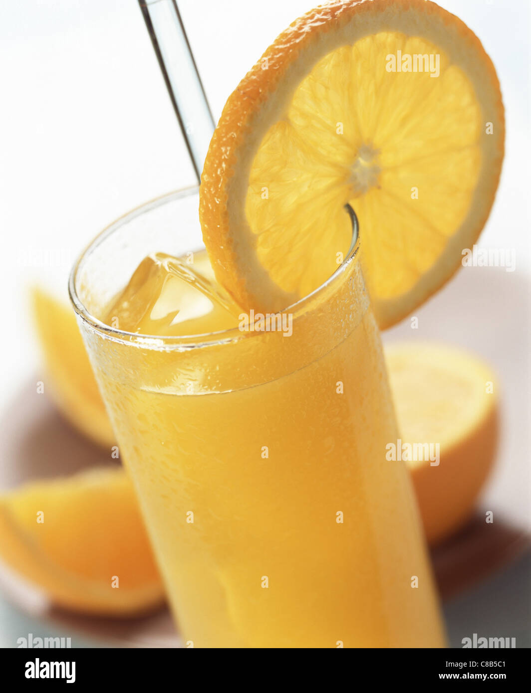 Glass of orange juice with orange slice Stock Photo Alamy