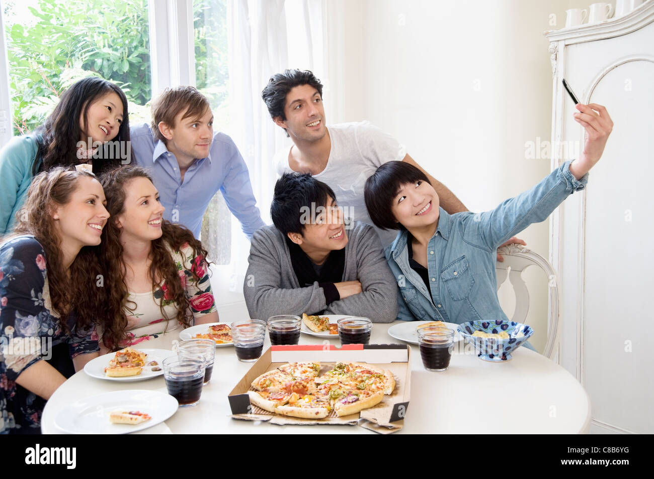 Group of friends taking self portrait photograph Stock Photo