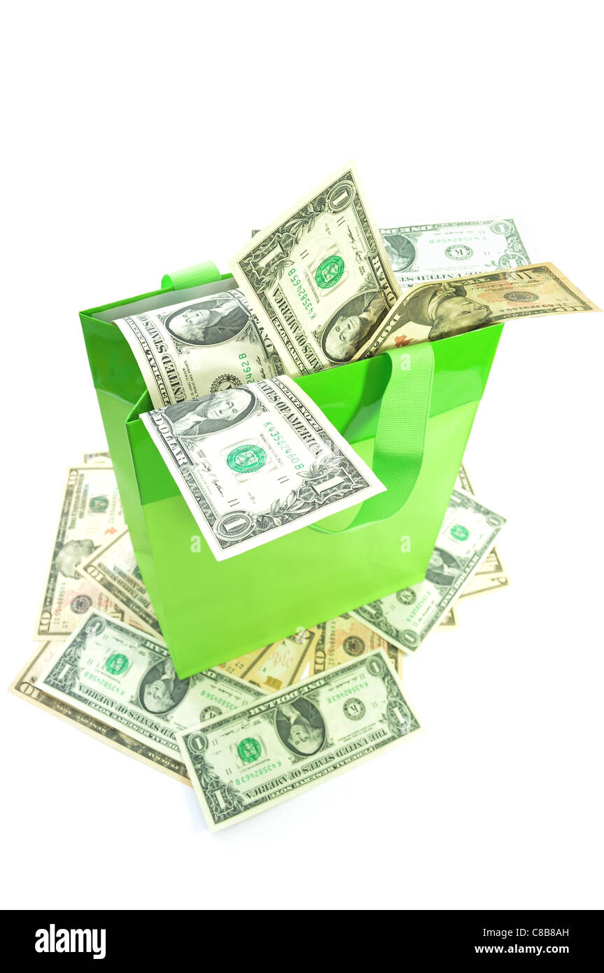 Gift bag packed with banknotes Stock Photo - Alamy