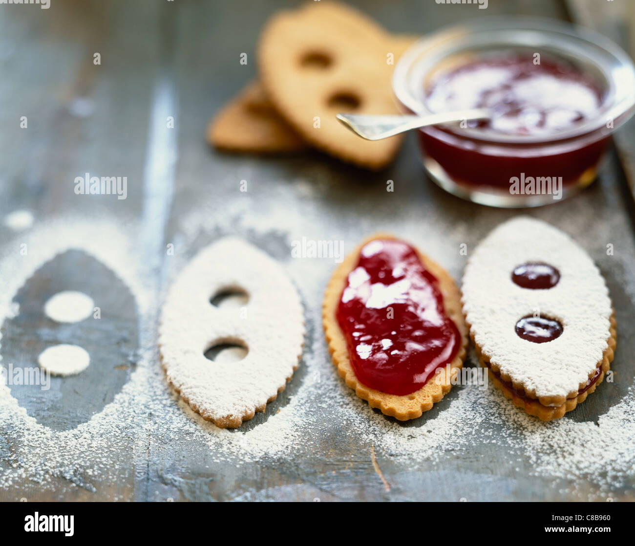 Preparing jam sandwich biscuits Stock Photo Alamy