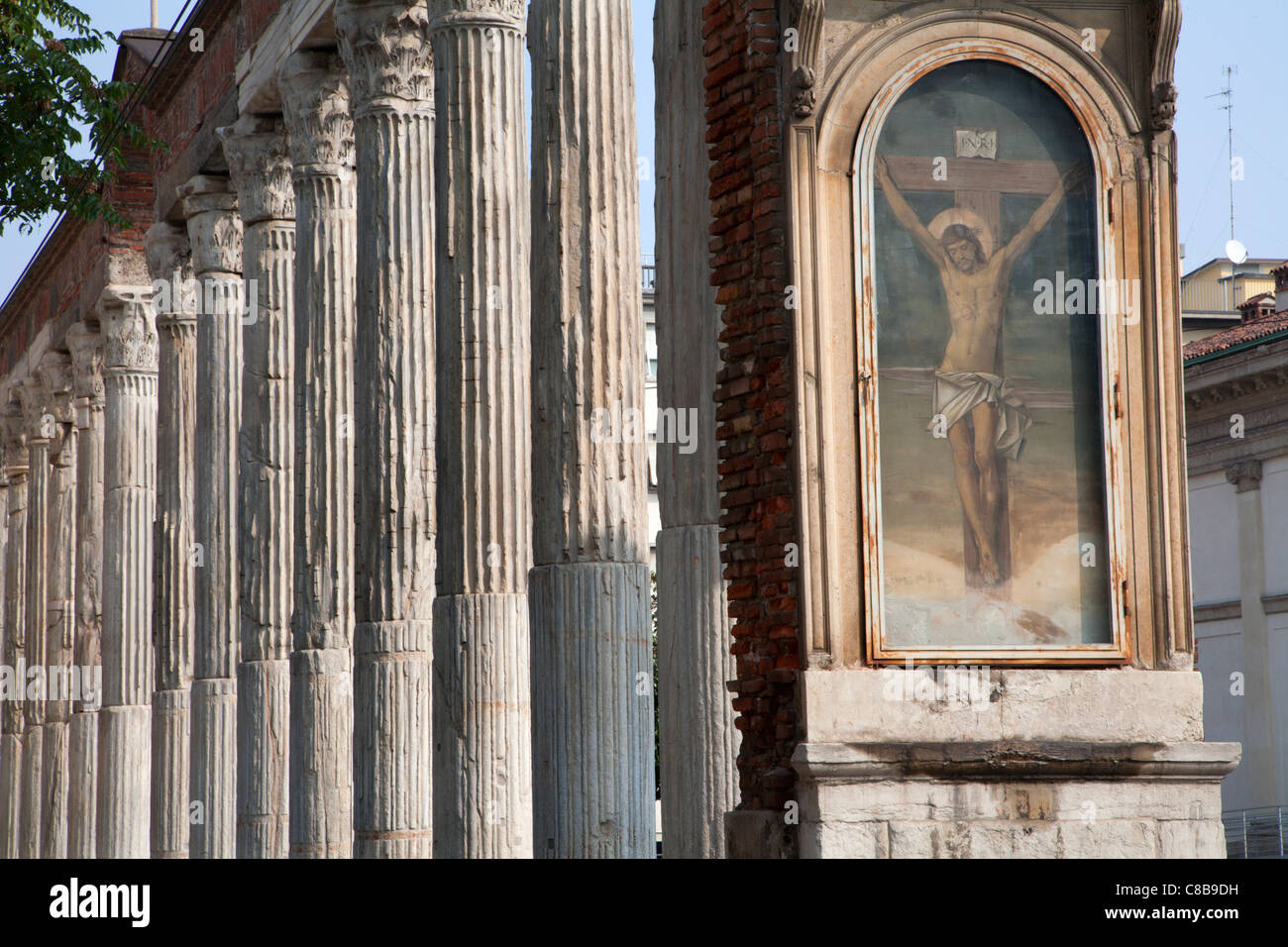 Milan - rome column by San Lorenzo church and Jesus paint Stock Photo