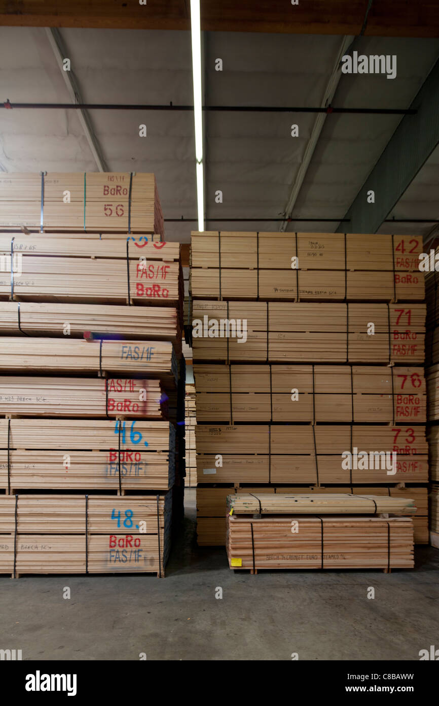 Stack of wooden plywood with markings in warehouse Stock Photo Alamy