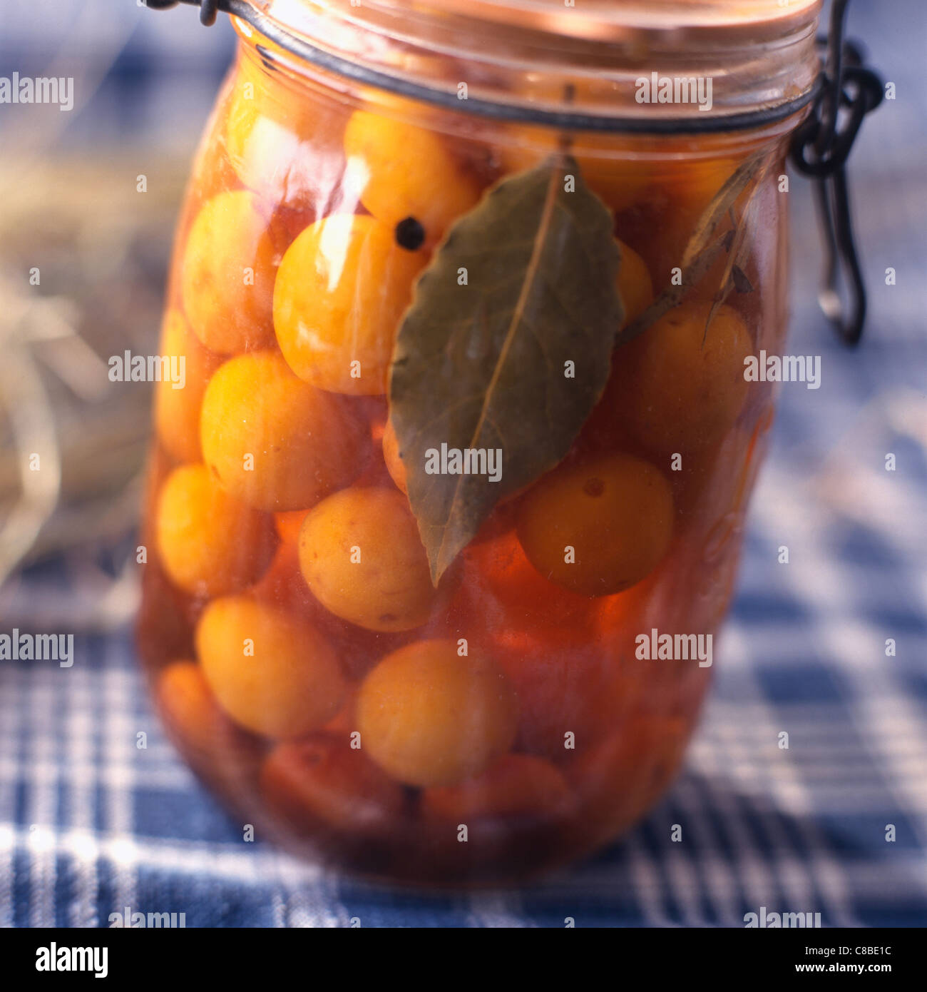 Jar of plums in vinegar Stock Photo Alamy