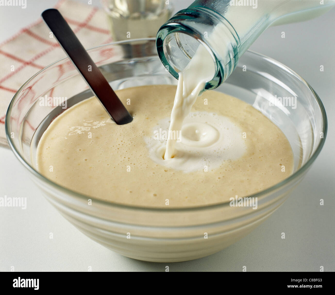 preparing crepe mixture Stock Photo