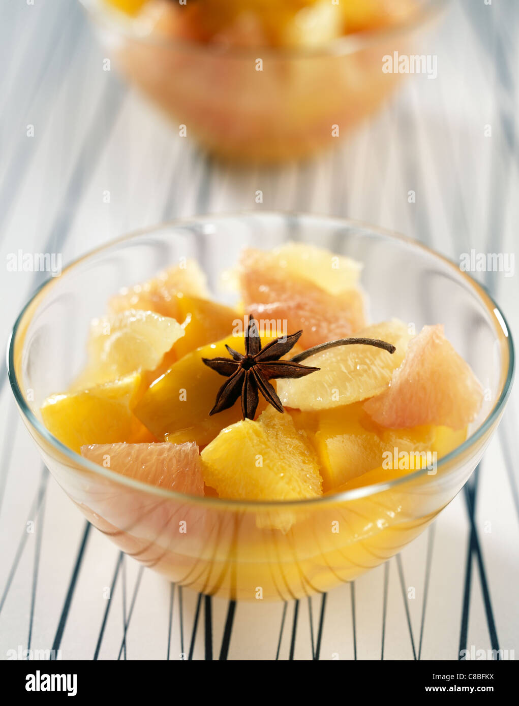 hot citrus fruit and rum salad Stock Photo