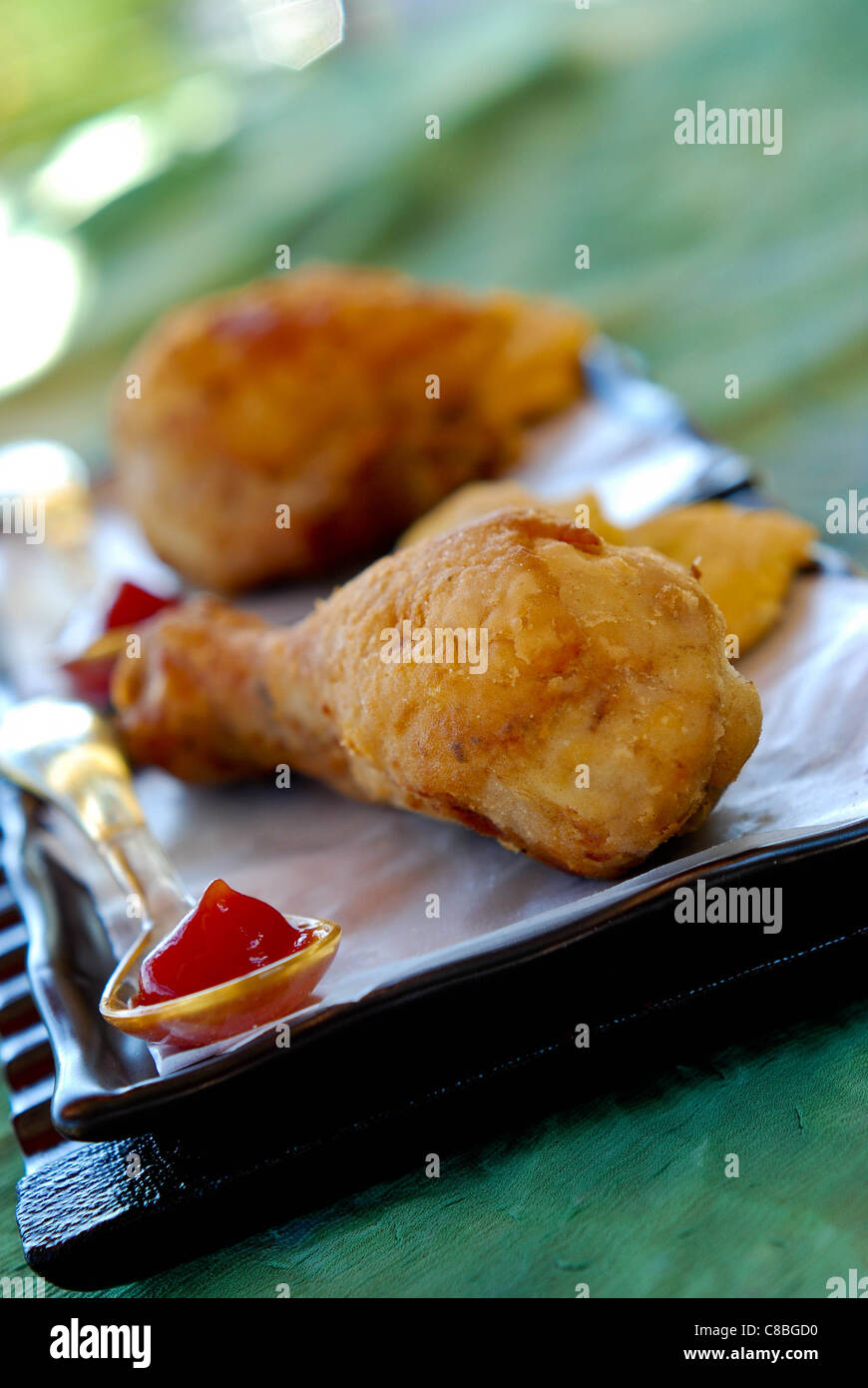 Fried chicken with ketchup Stock Photo Alamy