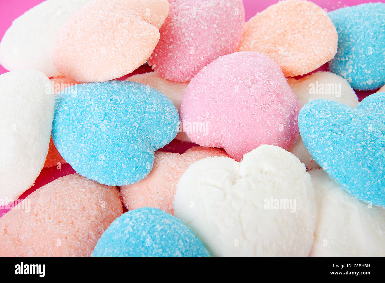 background of sugared candy in hearts shape Stock Photo
