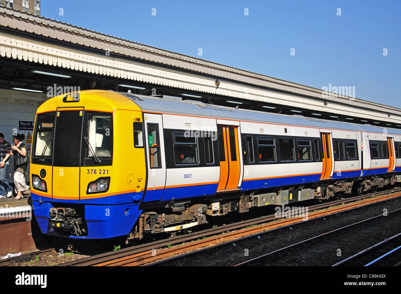 Underground train on platform at Clapham Junction Railway Station