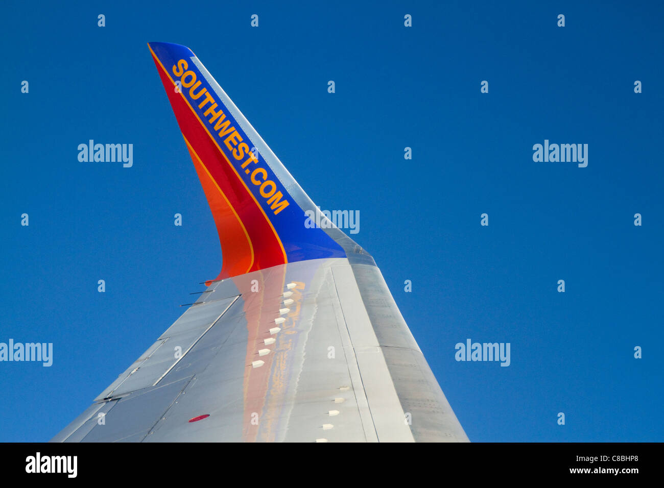 The wing of a Southwest Boeing 737 in flight. Stock Photo