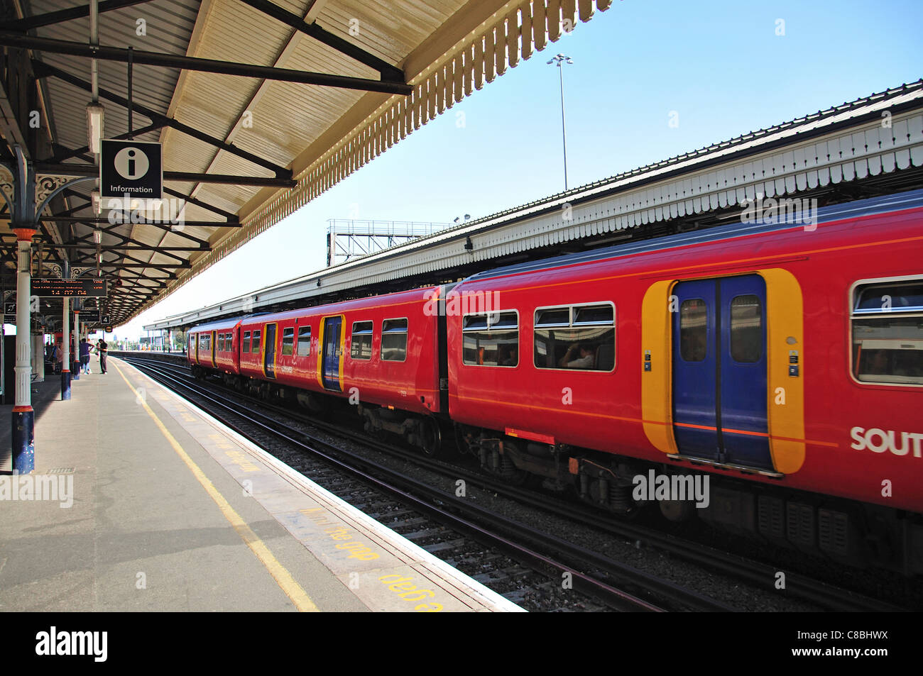 Train on platform at Clapham Junction Railway Station, Battersea, London Borough of Wandsworth, London, England, United Kingdom Stock Photo