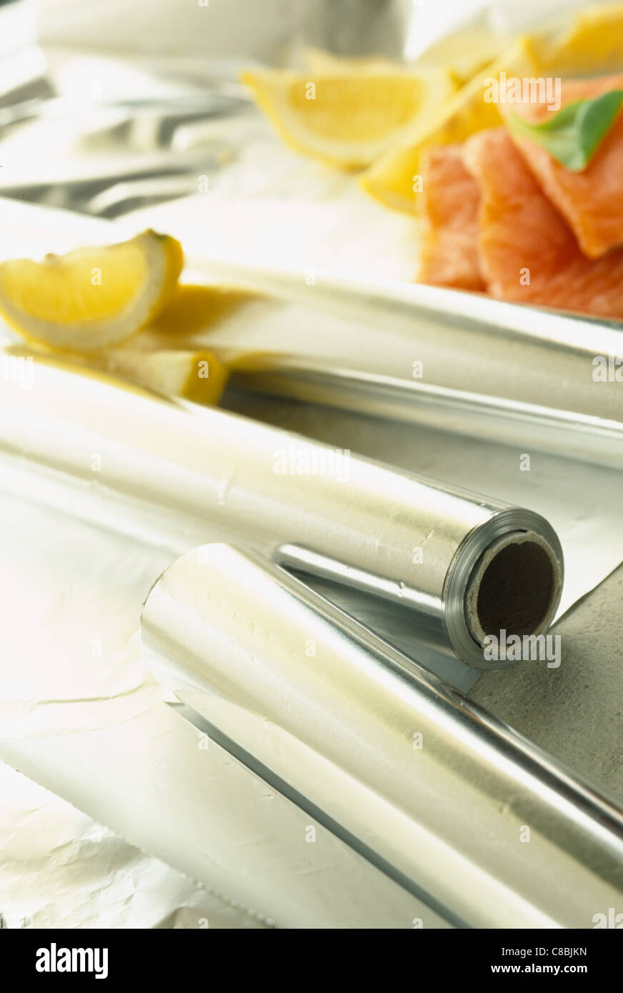 Aluminium foil, lemon and salmon Stock Photo Alamy