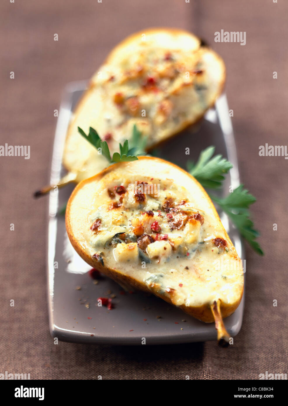 pears filled with blue cheese and walnuts Stock Photo Alamy
