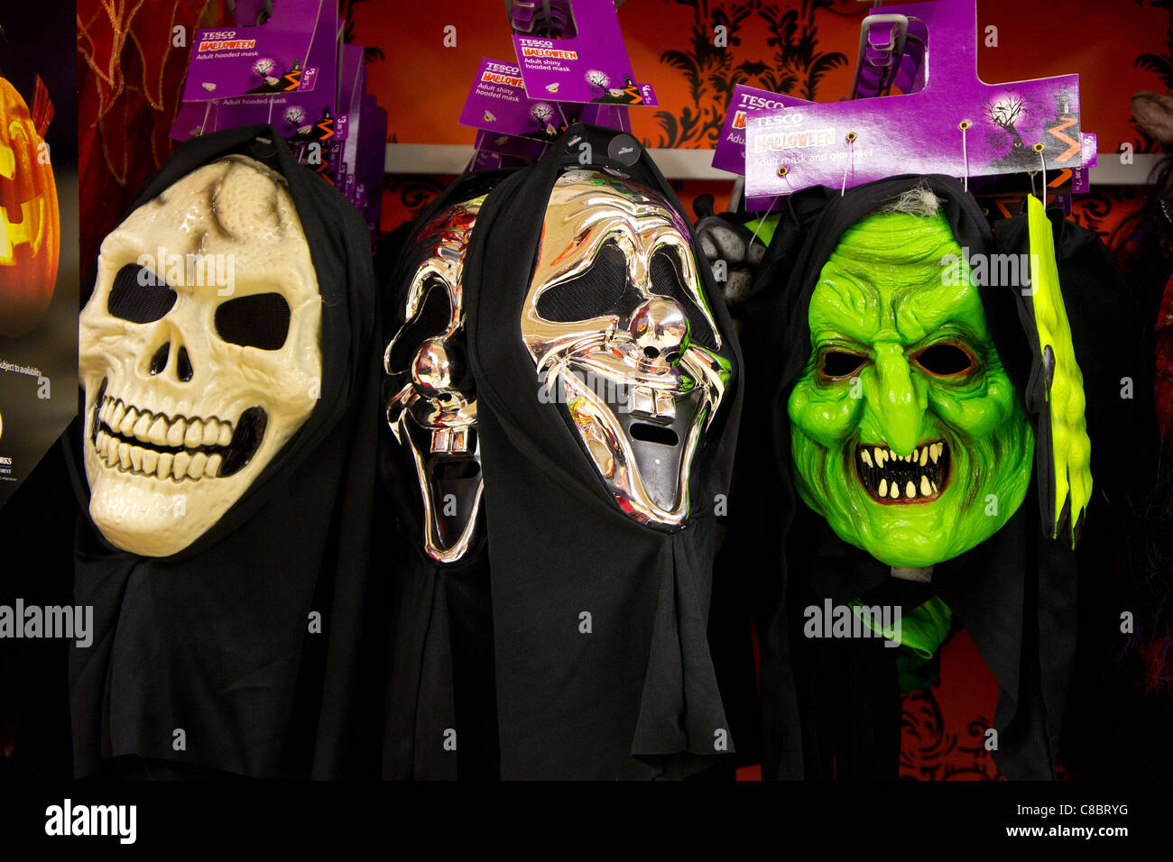 Halloween masks on sale in tesco supermarket, uk Stock Photo