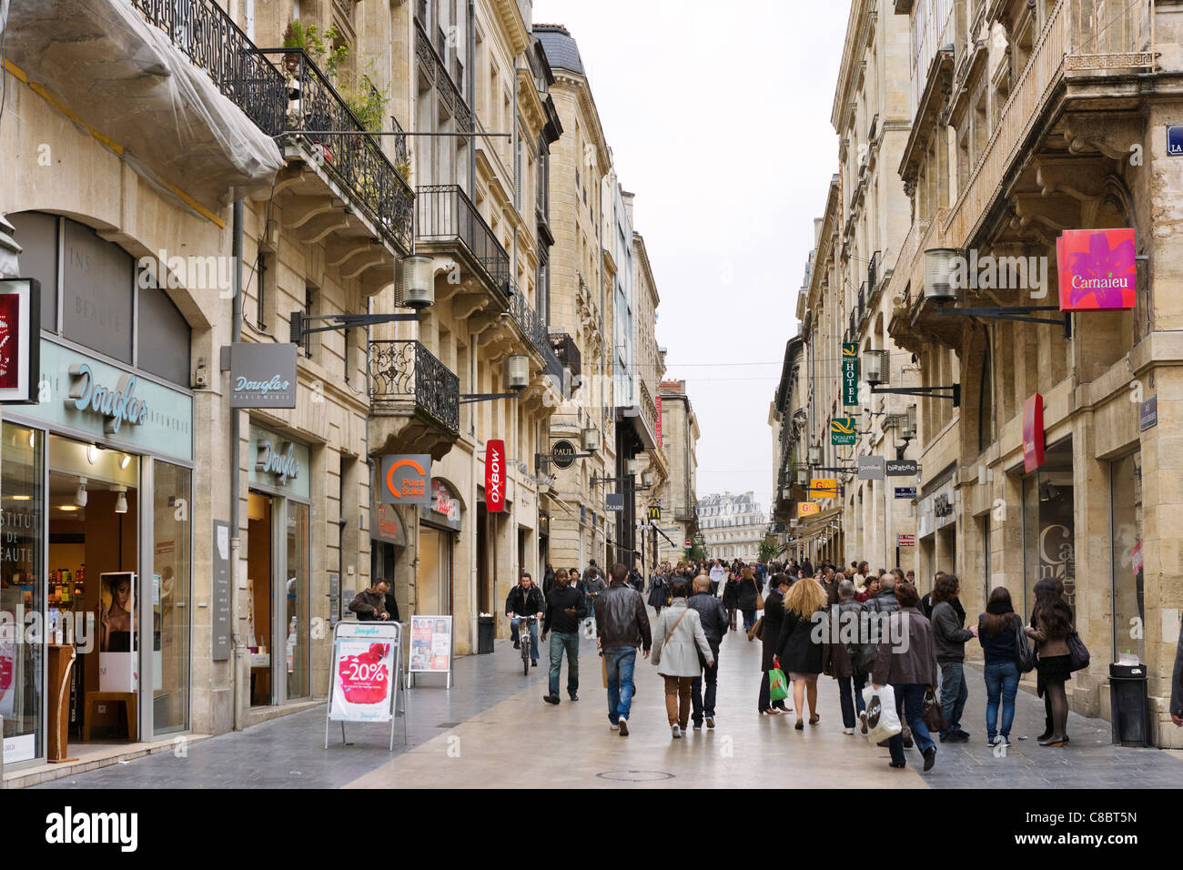 Shops on Rue Ste Catherine in the city centre, Quartier St Pierre, Bordeaux, Aquitaine, France Stock Photo