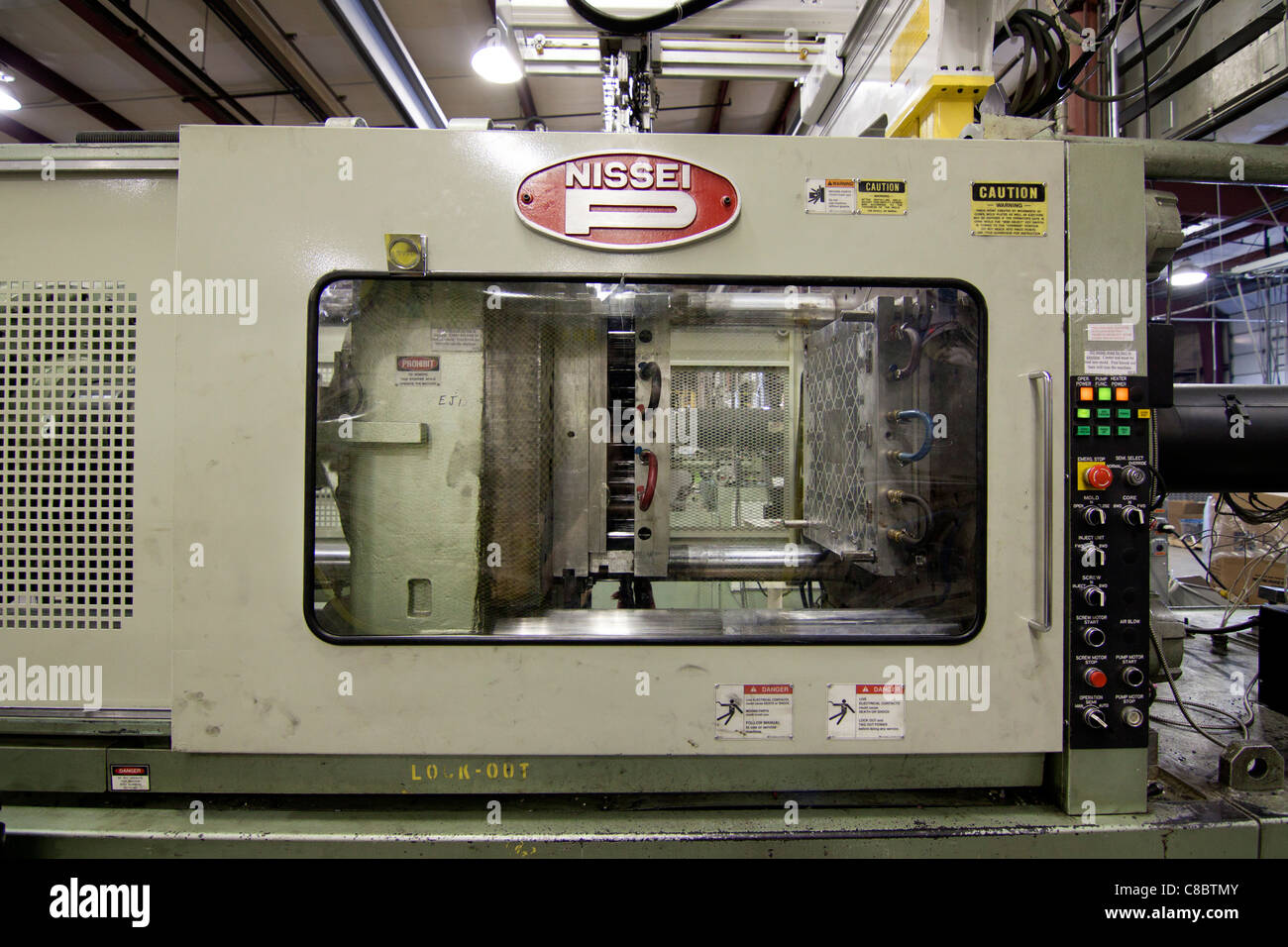 A plastics molding injection machine in Hudson, Colorado, USA Stock