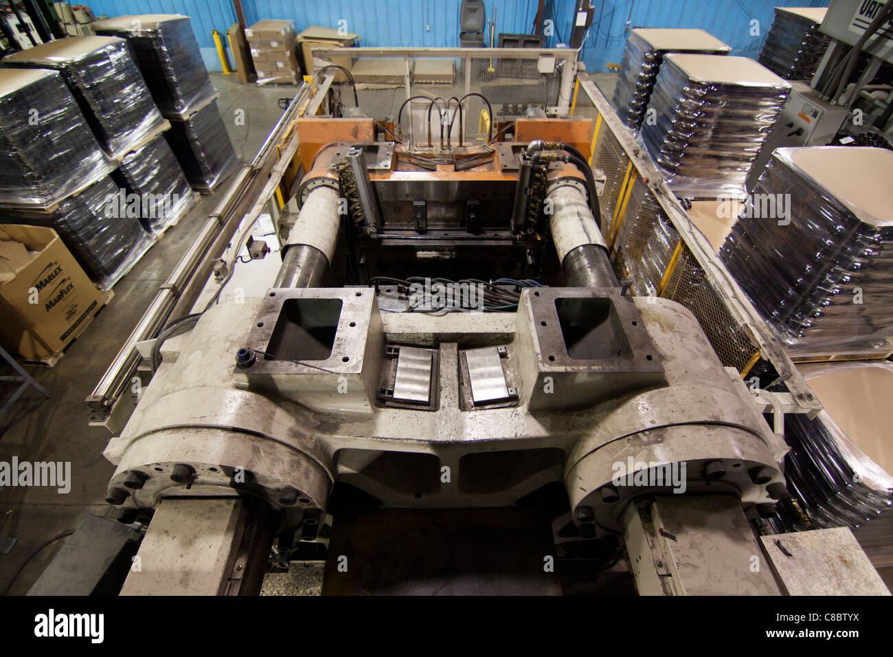 A plastics molding injection machine in Hudson, Colorado, USA Stock