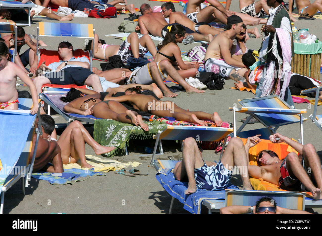 people sunbathing Ostia beach Italy Stock Photo