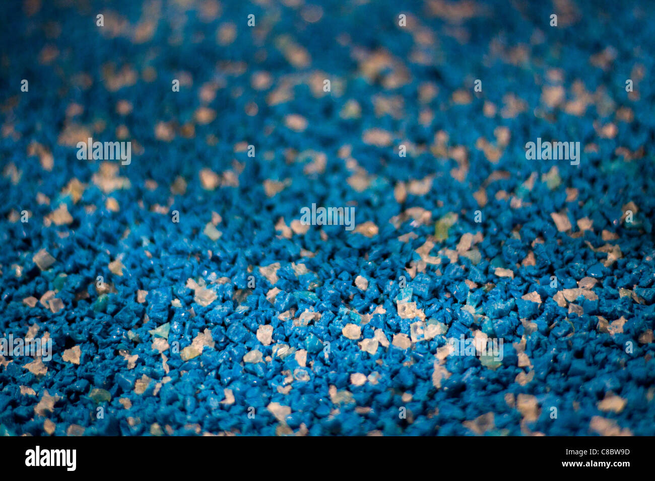 Recycled blue and white plastic "nurdles" (shredded plastic raw