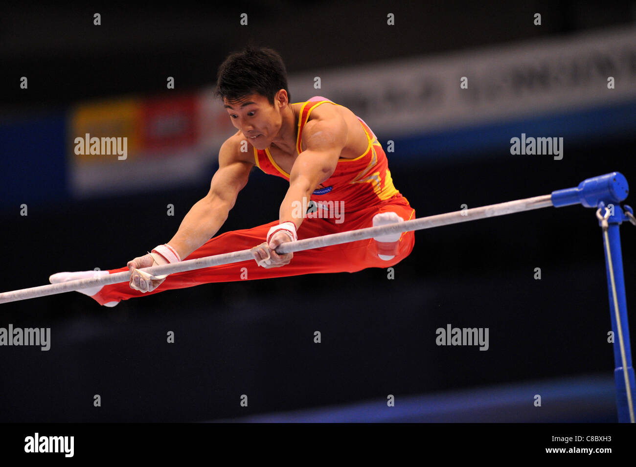 Teng Haibin (CHN) performs during the FIG World Artistic Gymnastics Championships Tokyo 2011. Stock Photo