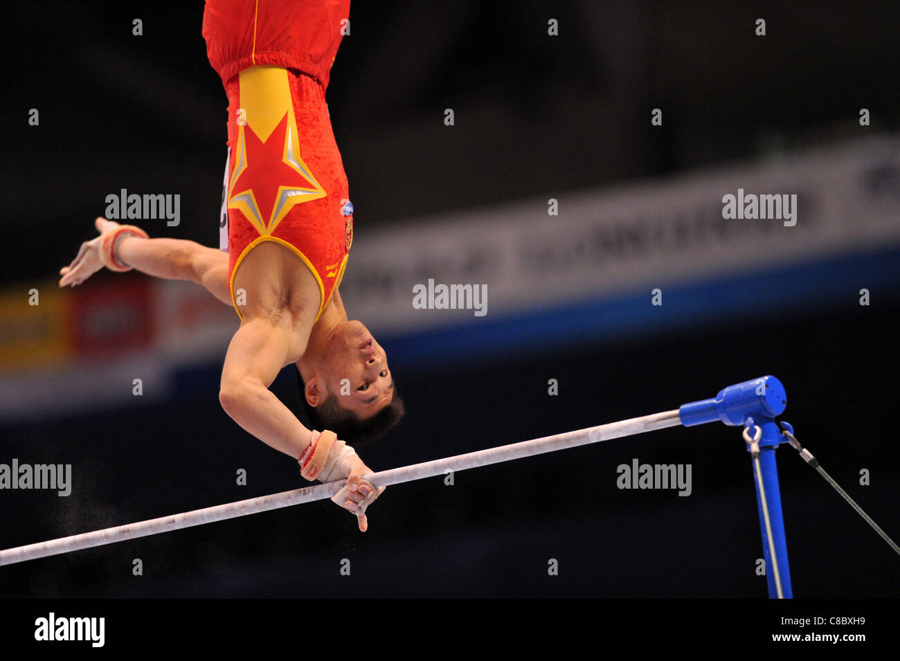 Zhang Chenglong (CHN) performs during the FIG World Artistic Gymnastics Championships Tokyo 2011. Stock Photo