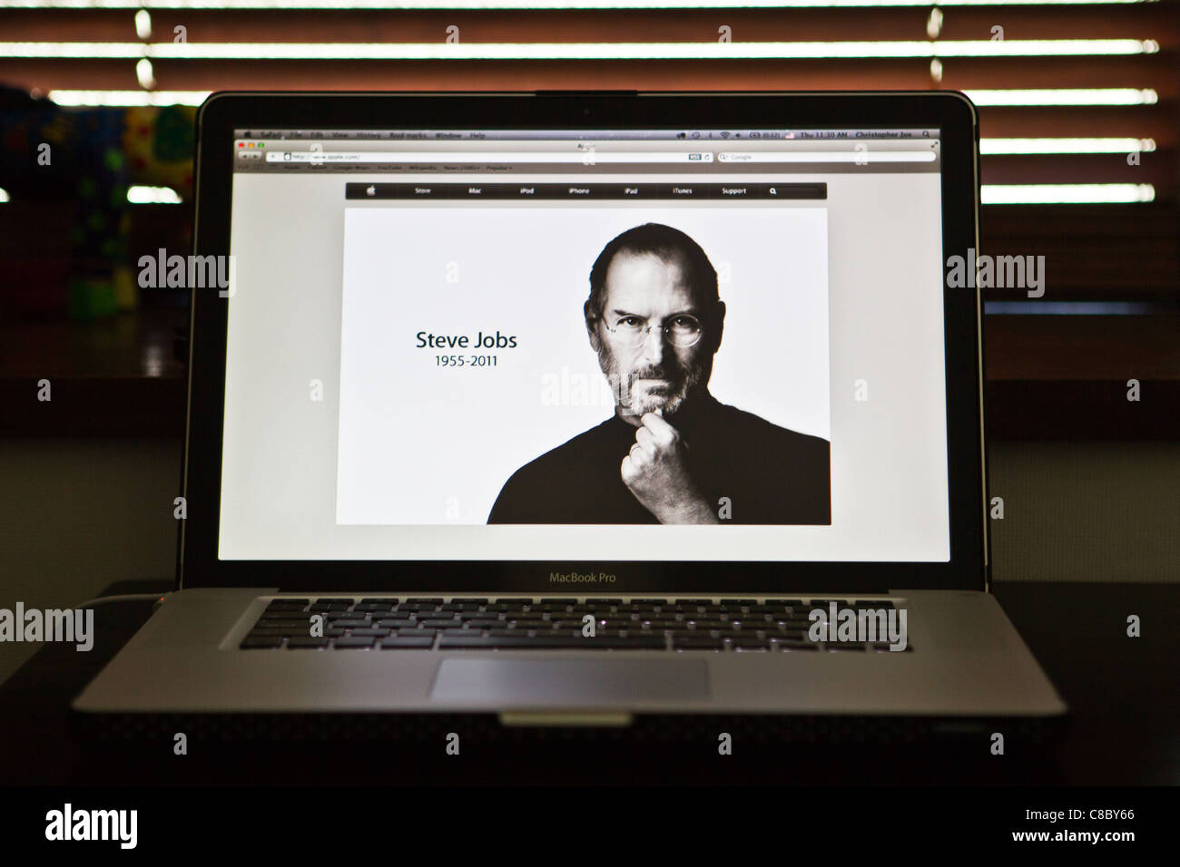 An image of the late Steve Jobs, founder and former CEO of Apple Inc., is displayed on the screen of an Apple Macbook Pro. Stock Photo