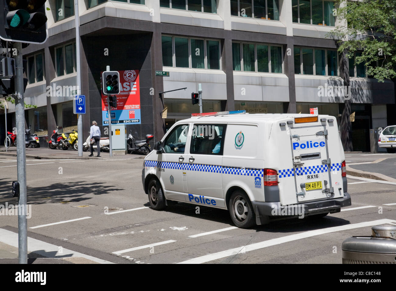 Australian New South Wales police van driving through Sydney CBD, rear view, Australia, 2011 Stock Photo