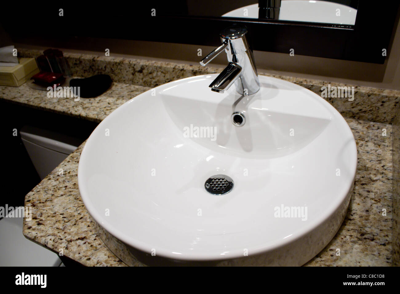 white modern luxury bathroom sink chrome facet Stock Photo