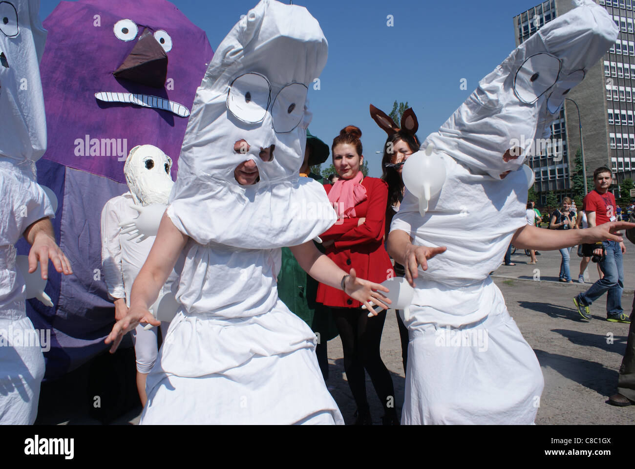 Students disguised as moomins, Groke, Hattifatteners, Little My and Sniff during Juwenalia Students Festival in Cracow. Stock Photo