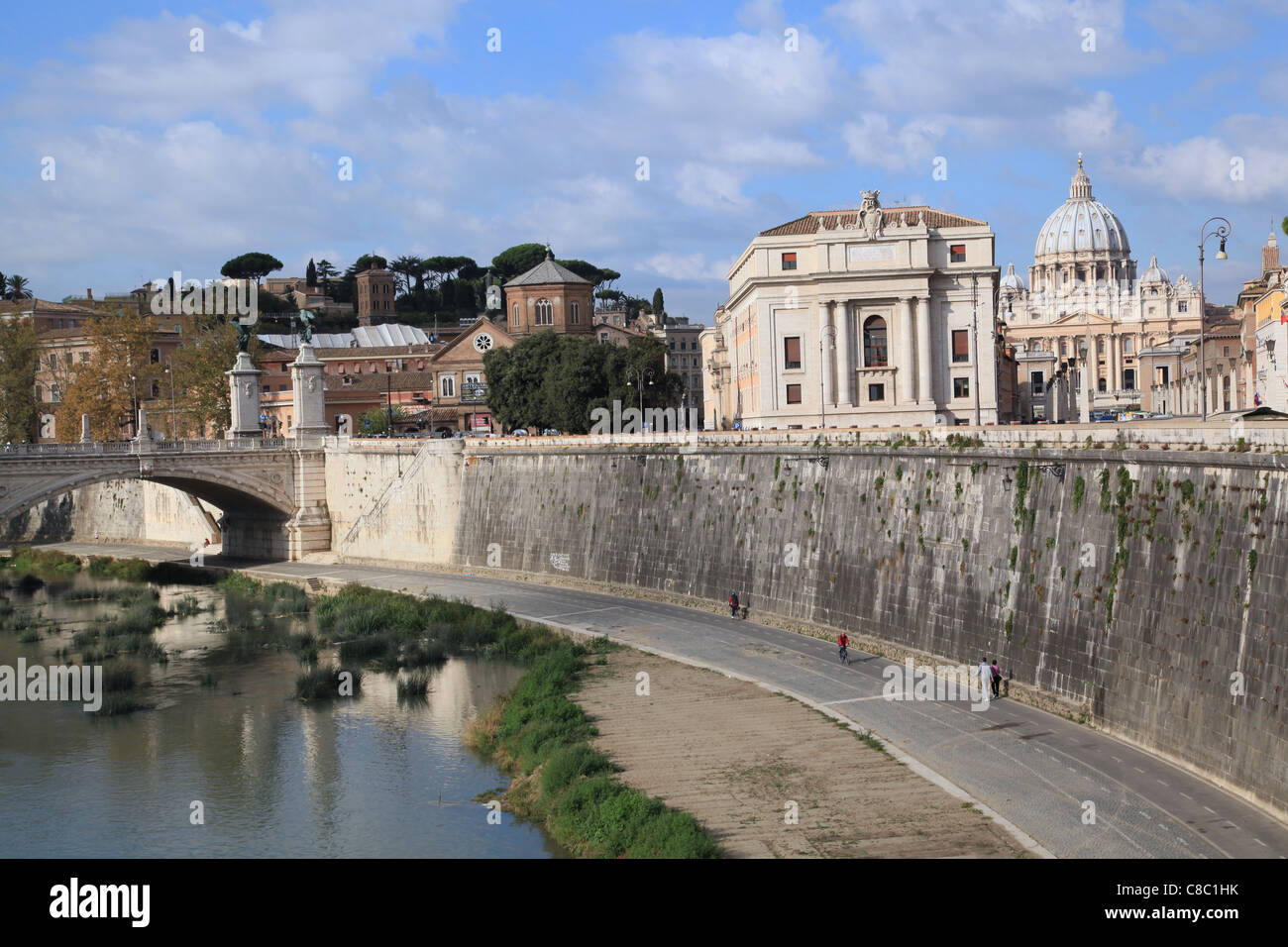 Rome Skyline looking over the Tiber River, with Dome of St. Peter's Basilica in the background, and recreational path Stock Photo