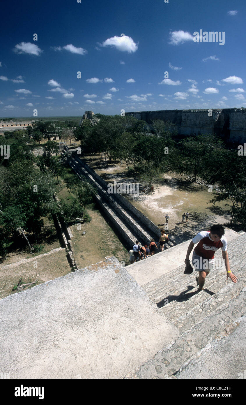 People climbing the Great Pyramid at the Uxmal Mayan Site, Yucatan
