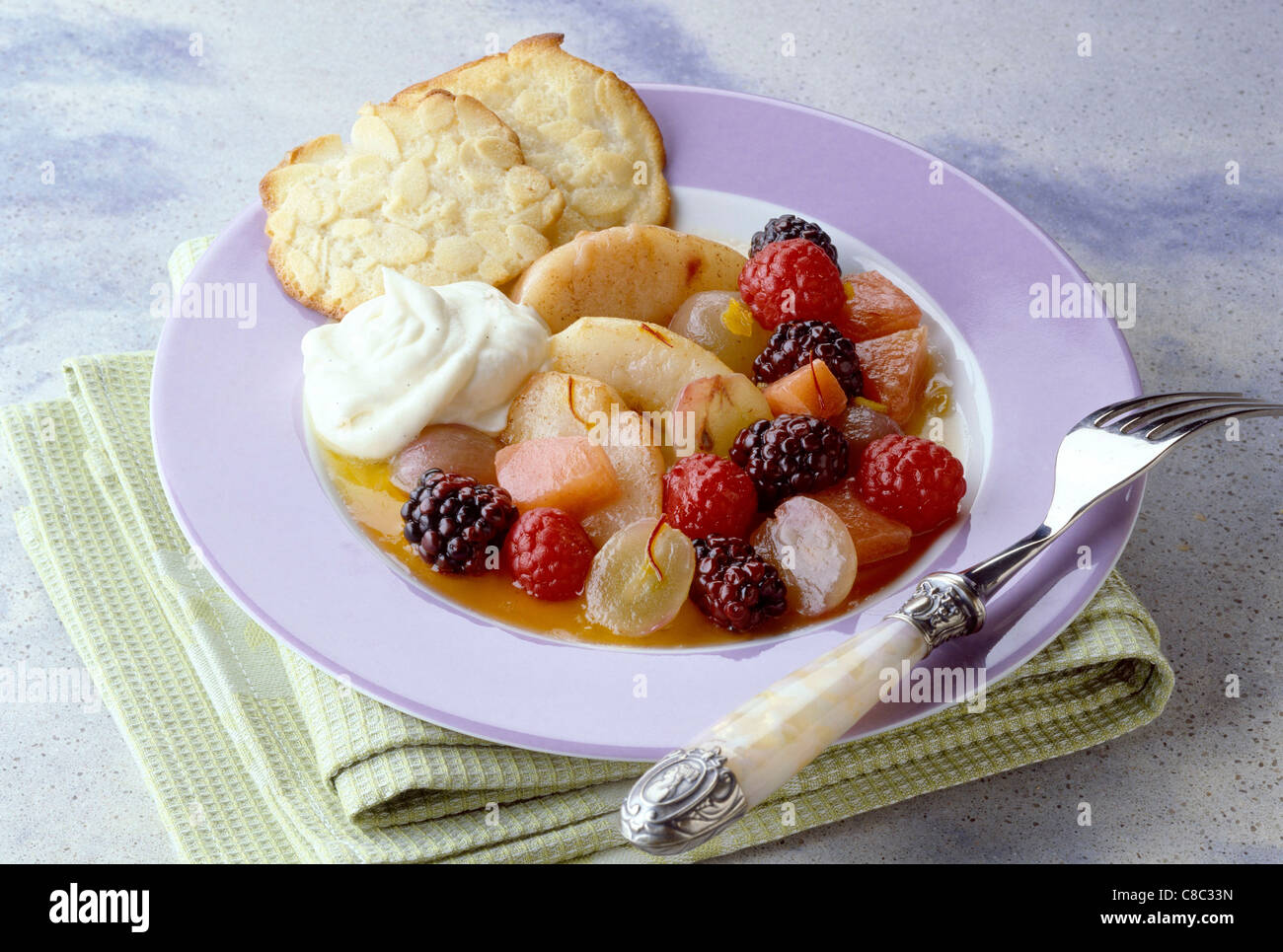 Mixed fruit dessert with almond tuile biscuit Stock Photo Alamy