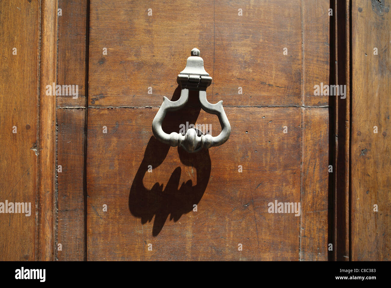 Old door knocker in L'Aquila, Italy. Stock Photo